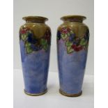 DOULTON STONEWARE, a pair of Doulton stoneware vases decorated with floral garlands above a