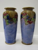 DOULTON STONEWARE, a pair of Doulton stoneware vases decorated with floral garlands above a