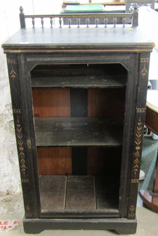 CARVED OPEN DISPLAY CABINET, ebonised display cabinet with foliate decoration to the frame, single