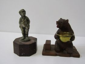 BLACK FOREST BEAR, carved seated Black Forest Bear matchbox stand, holding a brass dish, 11cm width,