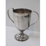 SILVER TWIN HANDLED TROPHY CUP on circular stemmed support, HM Peter and William Bateman, London,