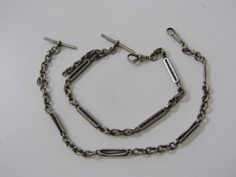 2 FANCY SILVER ALBERT CHAINS, 39cm and 45cm respectively,