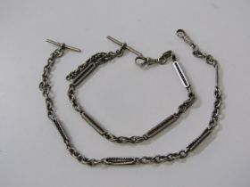 2 FANCY SILVER ALBERT CHAINS, 39cm and 45cm respectively,