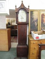 8 DAY LONG CASE CLOCK by Nelson of Market Deeping with painted arch dial, oak case with ebony