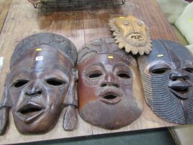 CARVED AFRICAN MASKS, 3 large carved hardwood African masks, approx 55cm, together with 1 other