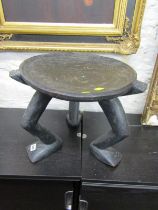 CARVED ETHNIC STOOL, African 3 legged stool, (1 foot a/f) 40cm diameter
