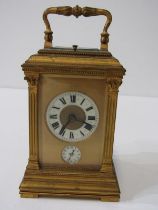 BRASS FRAMED REPEATER CARRIAGE CLOCK with main dial and subsidiary dial, coil bar strike with fluted