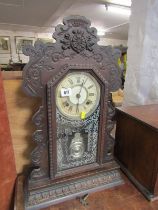 AMERICAN MANTLE CLOCK, Ansonia steeple design stained beech framed carved mantle clock 57cms high