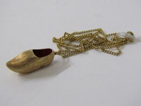 9ct YELLOW GOLD CLOG PENDANT, on yellow metal, tests 9ct gold curb chain, 4.7 grams combined