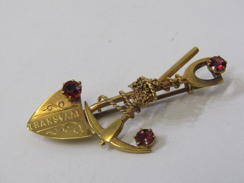SOUTH AFRICAN MINER'S BROOCH, 9ct yellow gold brooch in the form of a pick and shovel, set with 3