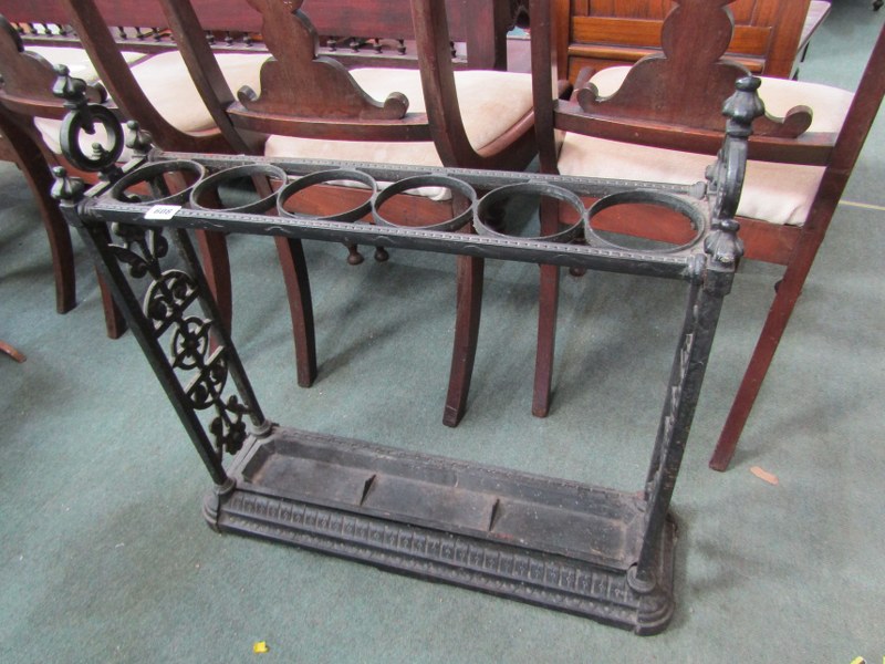 CAST IRON STICK STAND with pierced foliate panels to either side, 6 section top, 66cm width