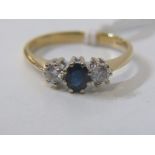 SAPPHIRE & DIAMOND 3 STONE RING, 18ct yellow gold ring set a central oval sapphire, flanked by 2