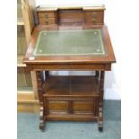 OAK DAVENPORT with brass gallery rail to top, 4 trinket drawers, fitted lower shelf with 2 drawers