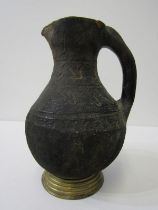 ANTIQUE POTTERY JUG, possibly North African with incised decoration, 20cm height