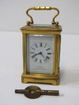 MINIATURE CARRIAGE CLOCK, white enamel dial marked Hawkey & Co, 123 Regent Street, 8cm height with