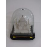 TAJ MAHAL, alabaster tabletop display of the Taj Mahal, under glass dome with wooden base, overall