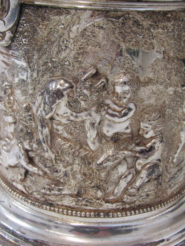 19th CENTURY PLATED BEER JUG, body decorated a continuous landscape of putti in relief with mask - Image 7 of 9