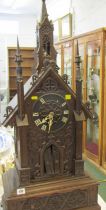 GERMAN ARCHITECTURAL BRACKET CLOCK, large carved steeple form bracket clock in the black forest