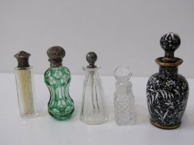 SCENT BOTTLES, 5 bottles including one with floral decoration on a black ground, 2 silver mounted