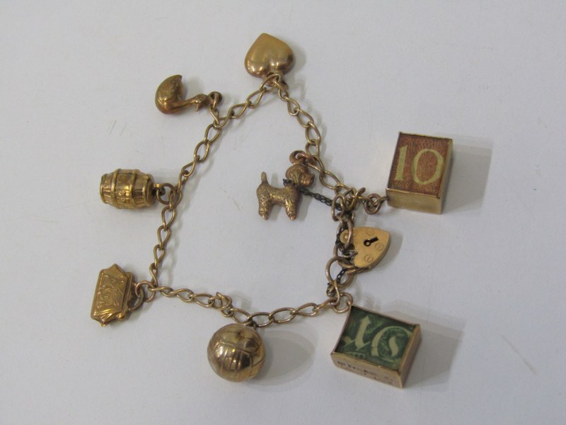 GOLD CHARM BRACELET, 9ct yellow gold charm bracelet with padlock clasp, set 8 charms including money