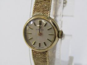 9ct YELLOW GOLD OMEGA LADY'S WRIST WATCH, 9ct gold case and bracelet, total weight including