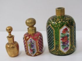 BOHEMIAN GLASS SCENT BOTTLES, red glass gilt decorated scent bottle with floral panels 6cms high,