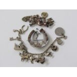 SELECTION OF SILVER ITEMS including silver charm bracelet of several charms; gypsy wagon, cathedral,