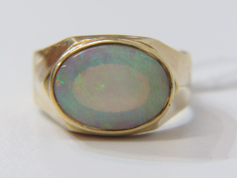 LARGE OPAL RING, 18ct heavy yellow gold ring set with cabochon style opal, ring size Q. 6.2 grams