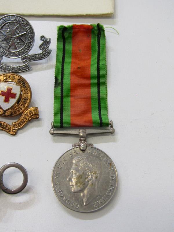 MILITARIA, WWII Defence medal, ARP badge and whistle, British Red Cross and St John Ambulance badge, - Image 3 of 5