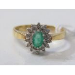 EMERALD AND DIAMOND CLUSTER RING, 18ct yellow gold ring set a central oval emerald surrounded by a