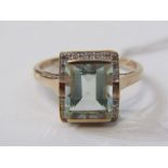 TOPAZ & DIAMOND RING, large rectangular cushion cut topaz, set within a cluster of diamonds, set