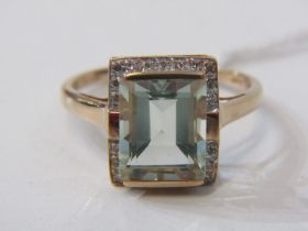 TOPAZ & DIAMOND RING, large rectangular cushion cut topaz, set within a cluster of diamonds, set
