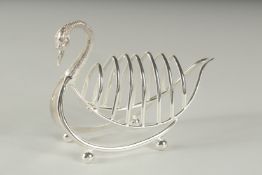 A SILVER PLATED SWAN TOAST RACK.