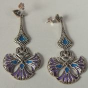A pair of silver plique enamel drop earrings in a box.