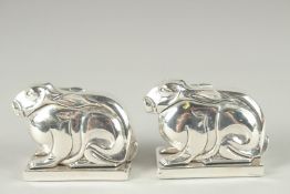 A PAIR OF DECO STYLE RABBIT SALT AND PEPPERS.2ins high