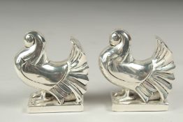 A pair of art Deco design dove salt and peppers.