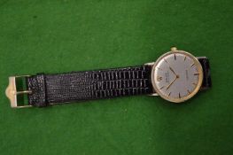 A gentleman's wrist watch.