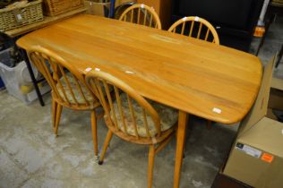 An Ercol table and four chairs.