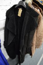 Vivian Westwood, a ladies black leather and faux fur trimmed coat, as worn on a fashion runway/