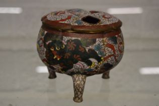 A Chinese cloisonne tripod censer and cover.