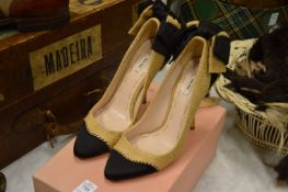 A pair of ladies Miu Miu hessian shoes, size 35, boxed.