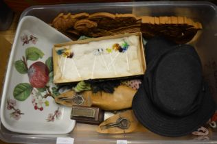 A box of miscellaneous collectables.