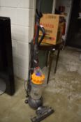 A Dyson DC40 upright vacuum cleaner.