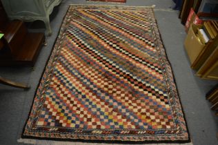 A good modern woollen carpet with diagonal geometric decoration 230cm x 144cm.