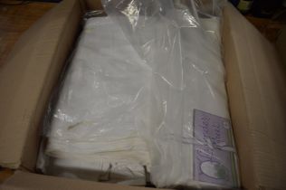 Four boxes of white table linen etc.