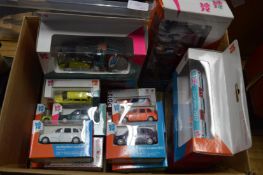 A collection of boxed die-cast taxi's and other items relating to the 2012 Olympic Games.