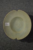 A Chinese celadon glazed lobed circular dish.