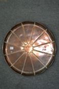 W A S Benson, a large shaped circular copper tray.
