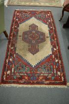 Persian rug (worn) 195cm x 95cm.