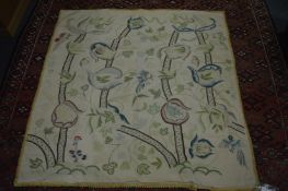 A French embroidered bedspread decorated with birds amongst trees with a silk trimmed border 4ft